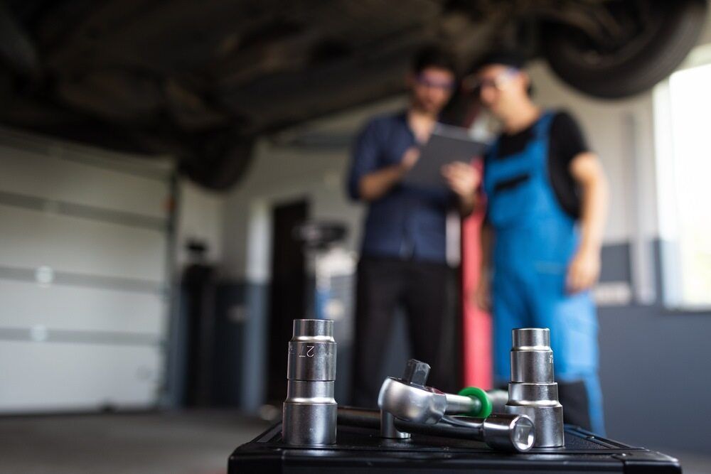 Cleaning The Back Seat Of The Car — MB Automotive In Garbutt, QLD