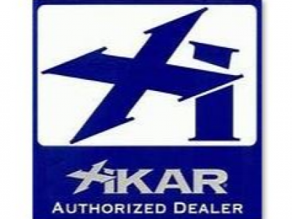 Blue-and-white Aikar Authorized Dealer sign with stylized star logo and text.