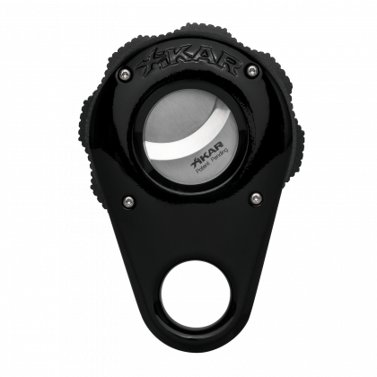 Black cigar cutter with silver blade and ringed handle on white background