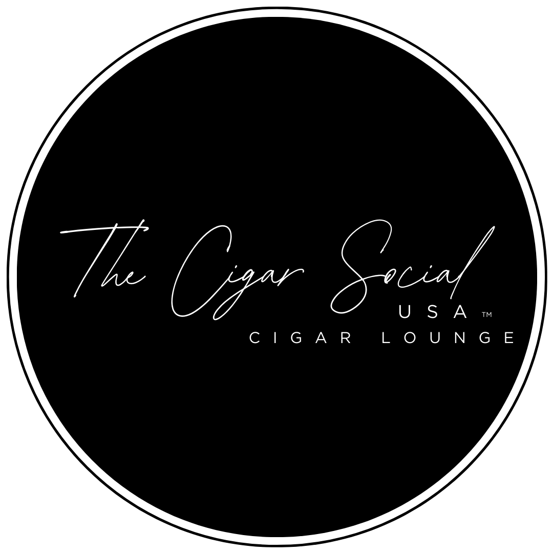 Black circular logo reading “The Cigar Social USA Cigar Lounge” in white script and text