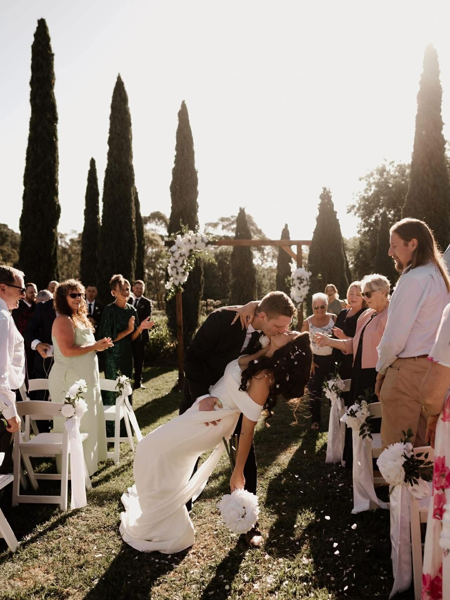 Bride and groom nailing the dip kiss with Cheryl Warry Celebrant
