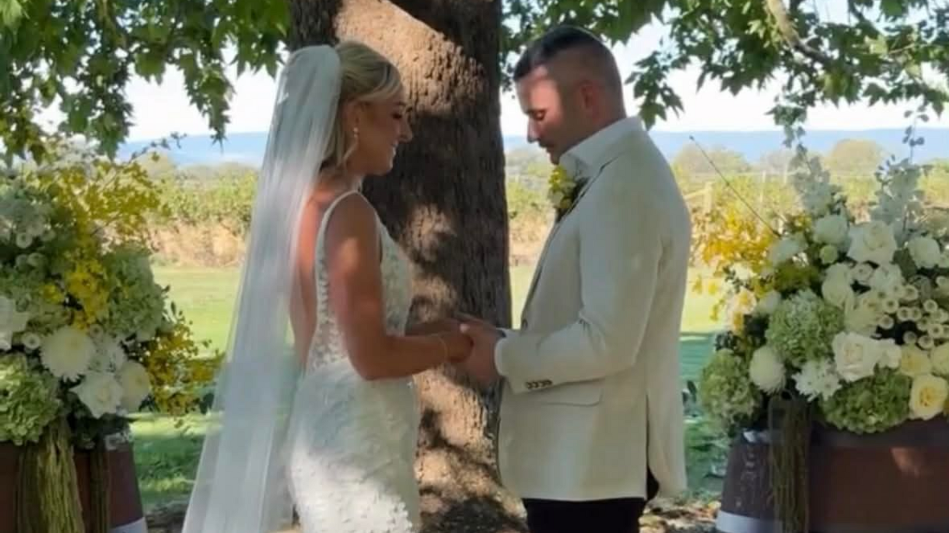 Marriage Celebrant Cheryl Warry officiating a winery wedding at Brown bros Milawa
