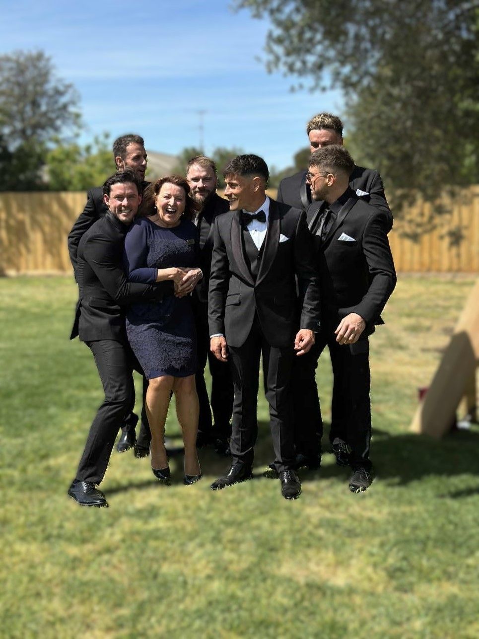Cheryl having fun with groomsmen at The Plough Inn, Tarrawingee - pic by Maddie of Milk and Honey Moments