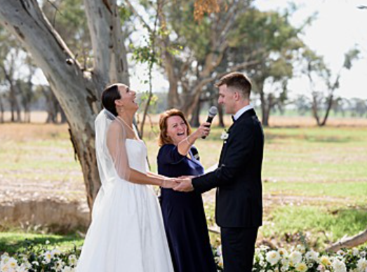 Marriage Celebrant Cheryl Warry Wangaratta - enjoying lighter moments with the groom during his vows
