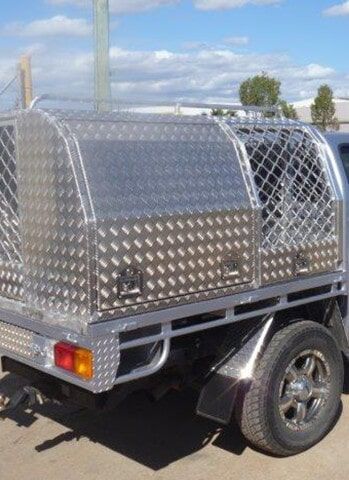 A Silver Truck with A Canopy Is Parked on The Side of The Road — Manufacturing Design Engineering in Garbutt QLD