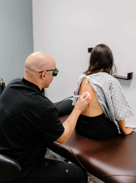 Laser Treatment On Legs — Evans, GA — Evans Sport & Spine Chiropractic Center