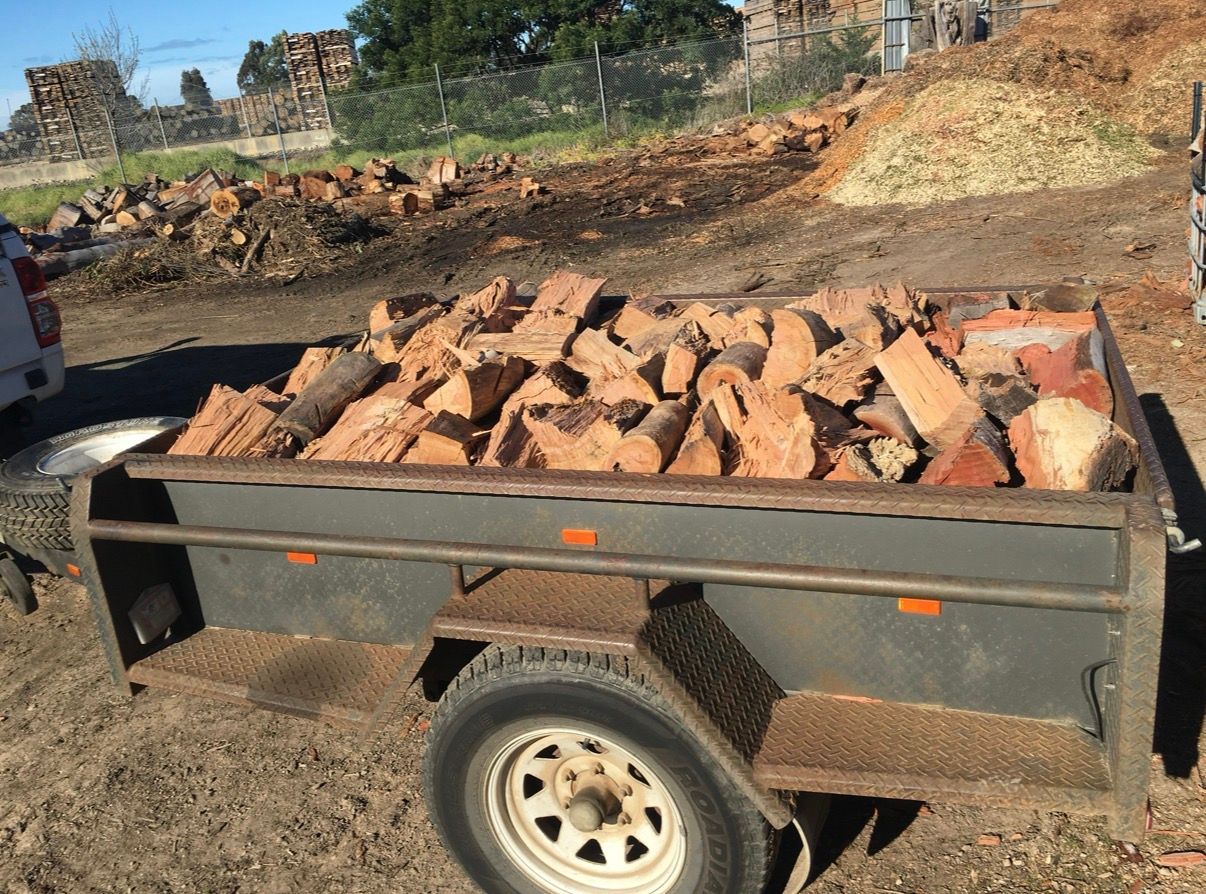 Trailer Loaded With Firewood.