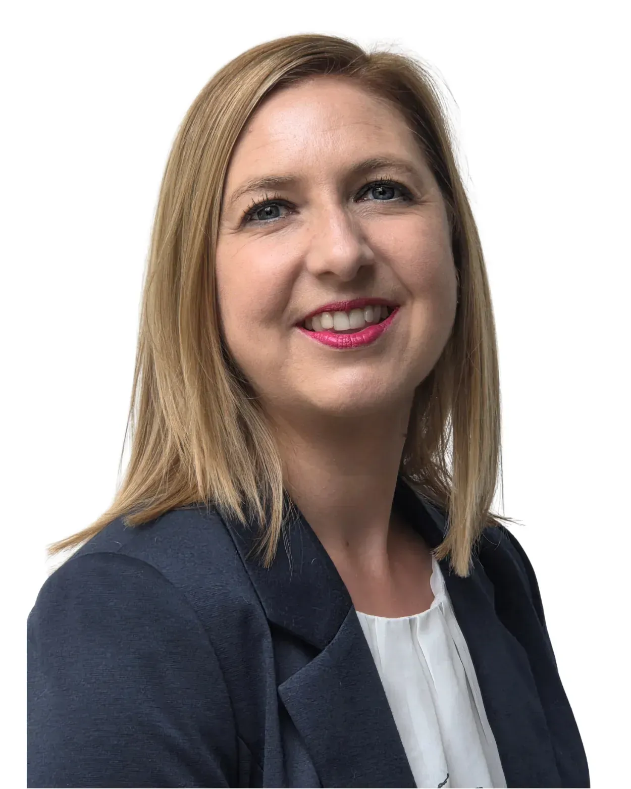 A person with shoulder-length blonde hair wearing a navy blue blazer over a white top, smiling against a white background.