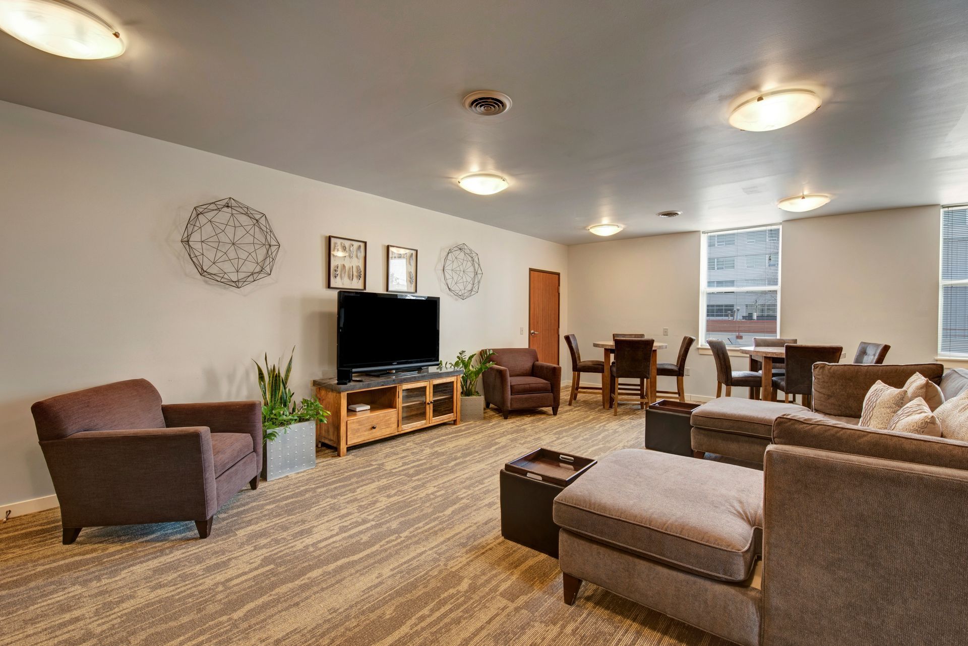 A living room filled with furniture and a flat screen tv.