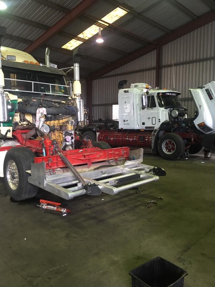 A Truck is Being Worked on in a Garage — Trucks On The Run Pty Ltd in Jondaryan, QLD