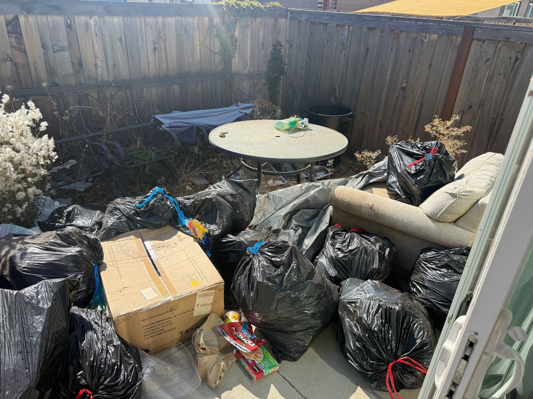 Backyard patio cleanout before and after in Chico, CA