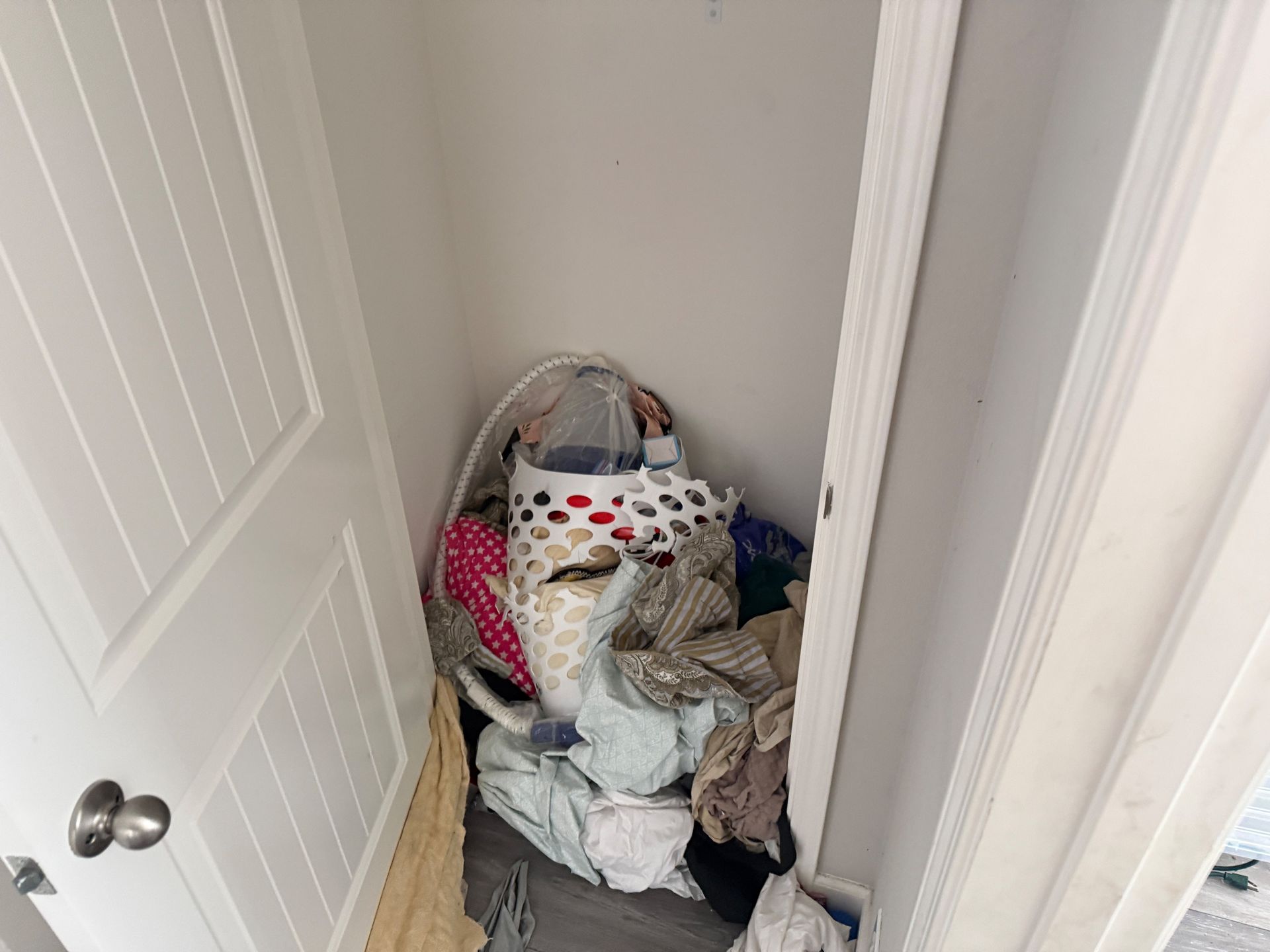 Closet emptied during a whole house cleanout in Chico, CA