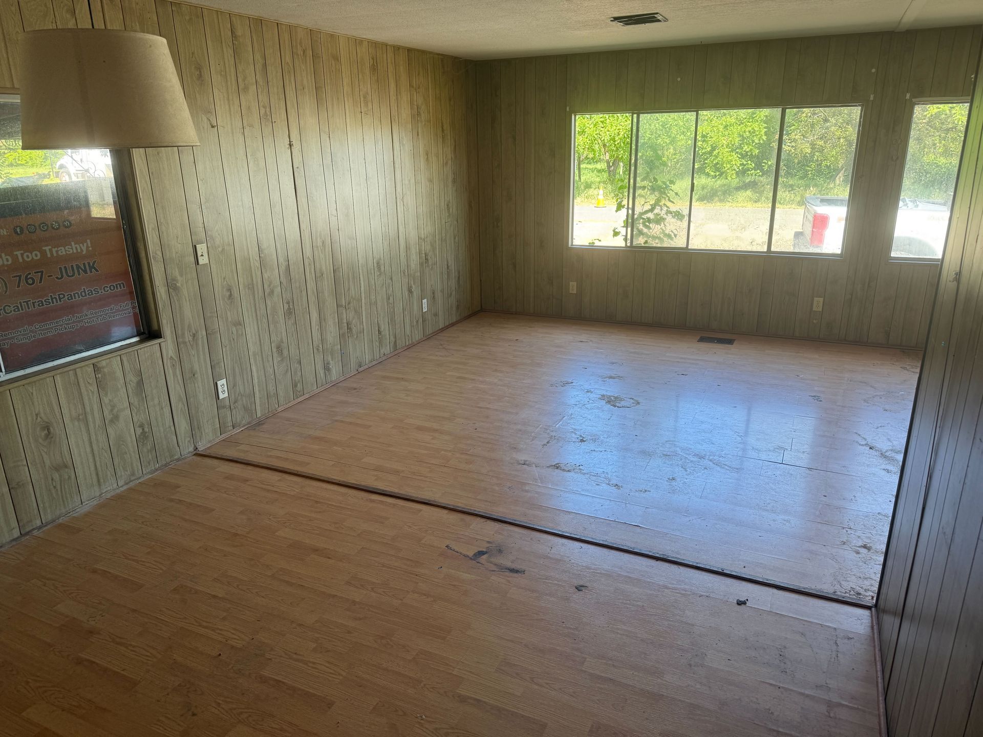 Hoarder cleanout in Gridley, CA — after: living room cleared of clutter