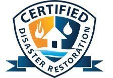 Certified Disaster Restoration logo with blue shield, white house, orange flame, and navy ribbon text