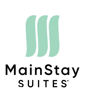 Logo for MainStay Suites: three light teal curved lines above black text