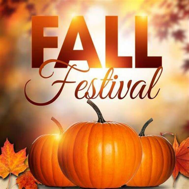 Fall Festival text above glowing pumpkins and autumn leaves