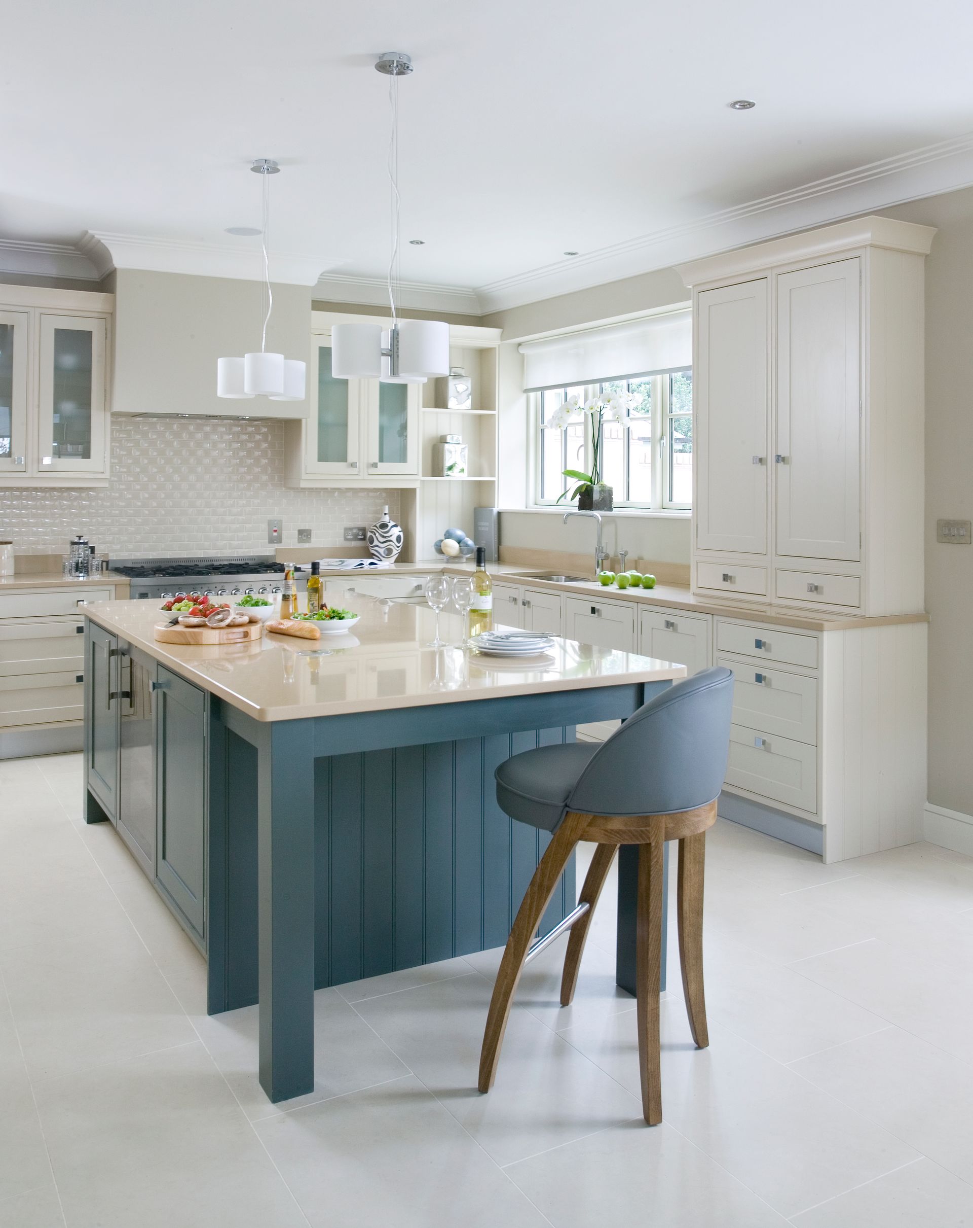 Bespoke Painted Buckingham Kitchen with open island in a dark teal paint and rest of the kitchen painted in a light colour