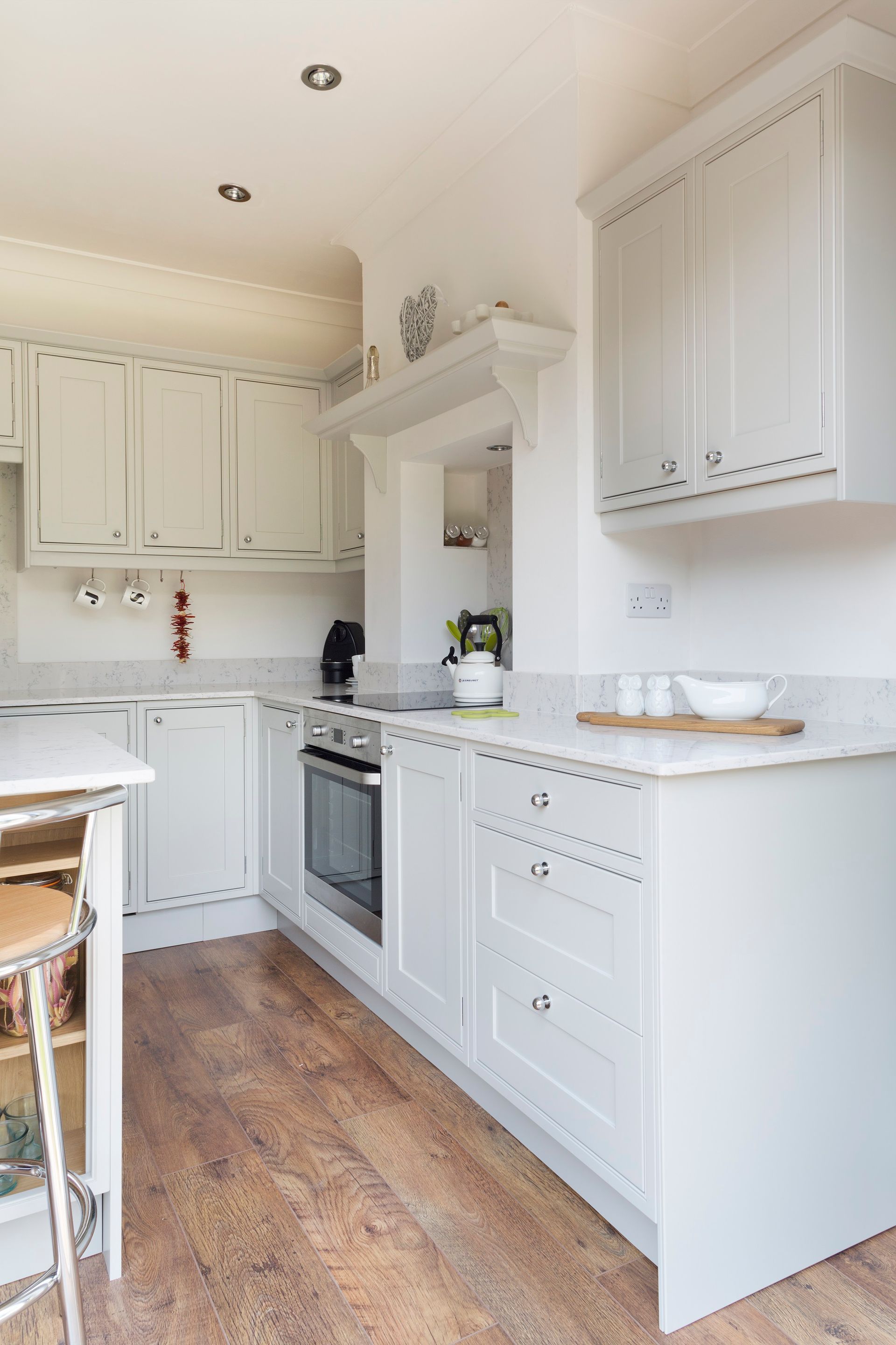 Buckingham with mantle with mantle shelf with induction hob and quartz marble effect worktops