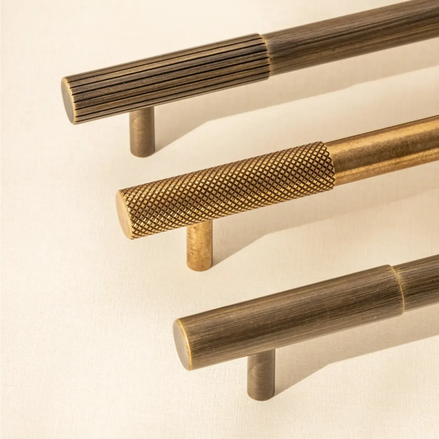 Three handles with different knurled patterns - plain, straight or diamond