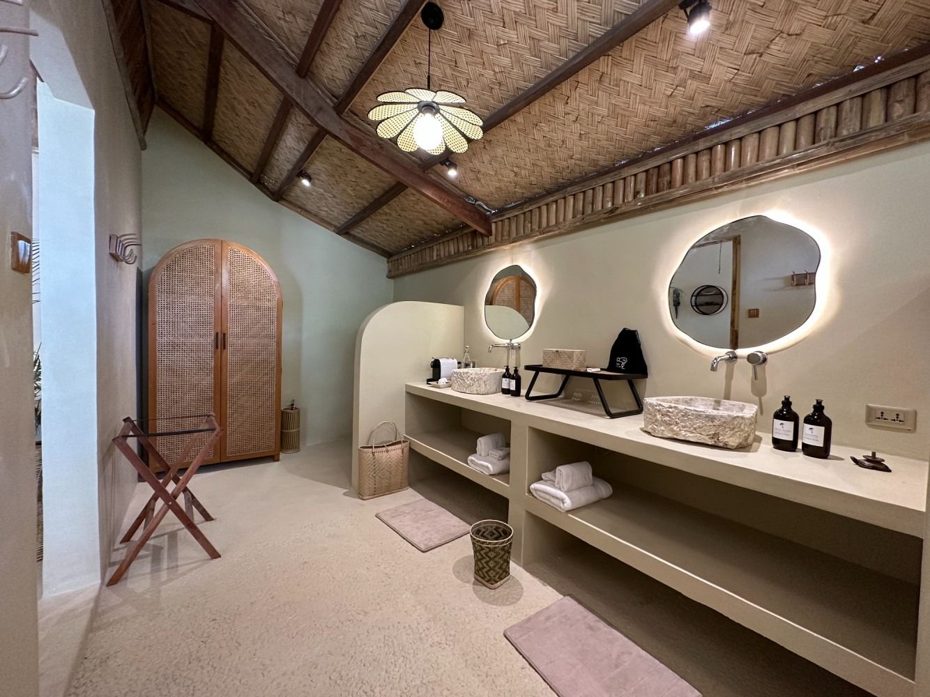 A bathroom with two sinks and two mirrors.