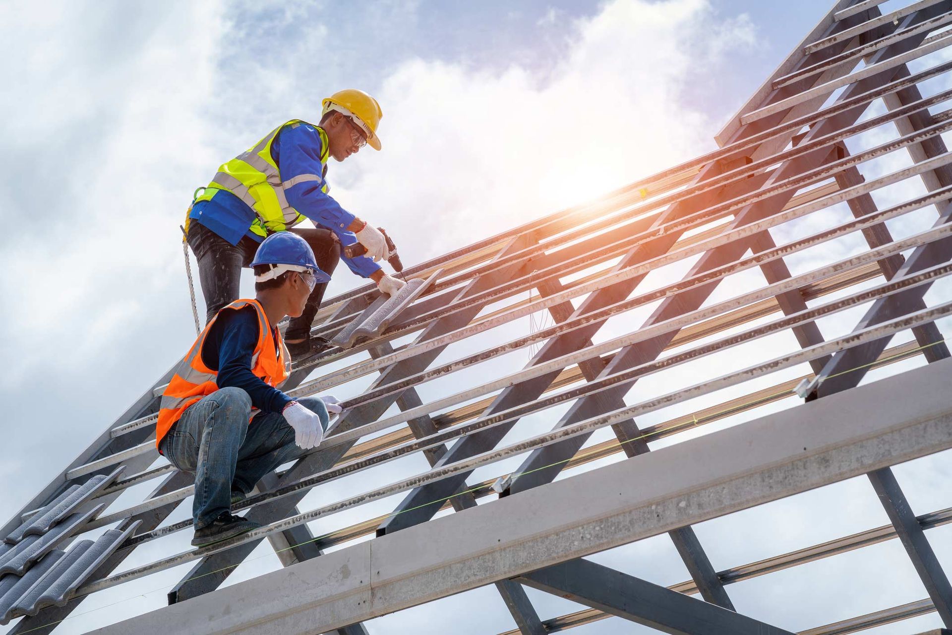 Workers working on the roof — Virginia Beach, VA — Custom Exteriors VA, LLC
