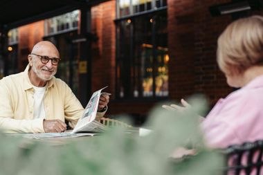 couple reading the newspaper