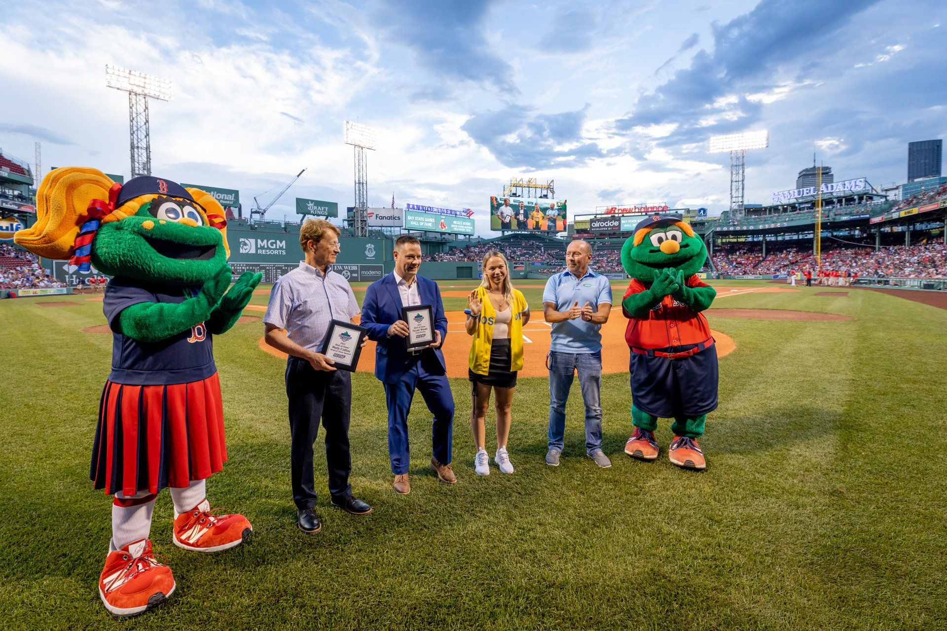 Hall of fame people on baseball field