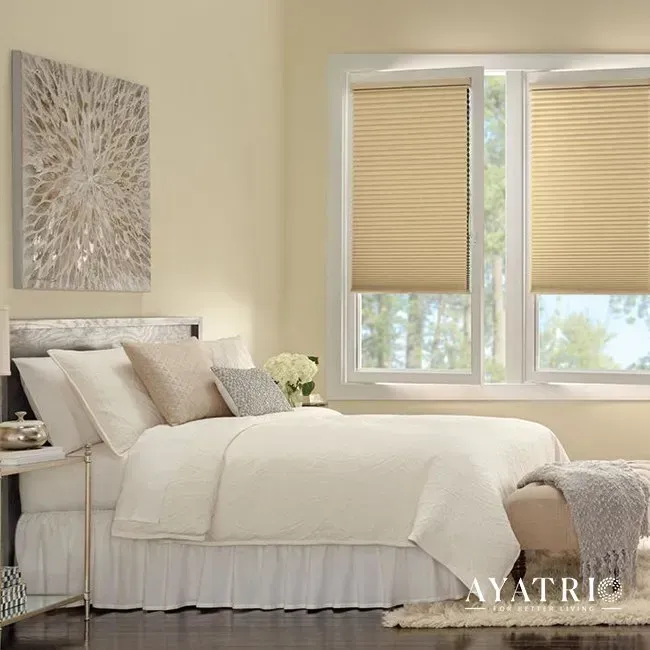 A bedroom with a bed , two windows and a rug.