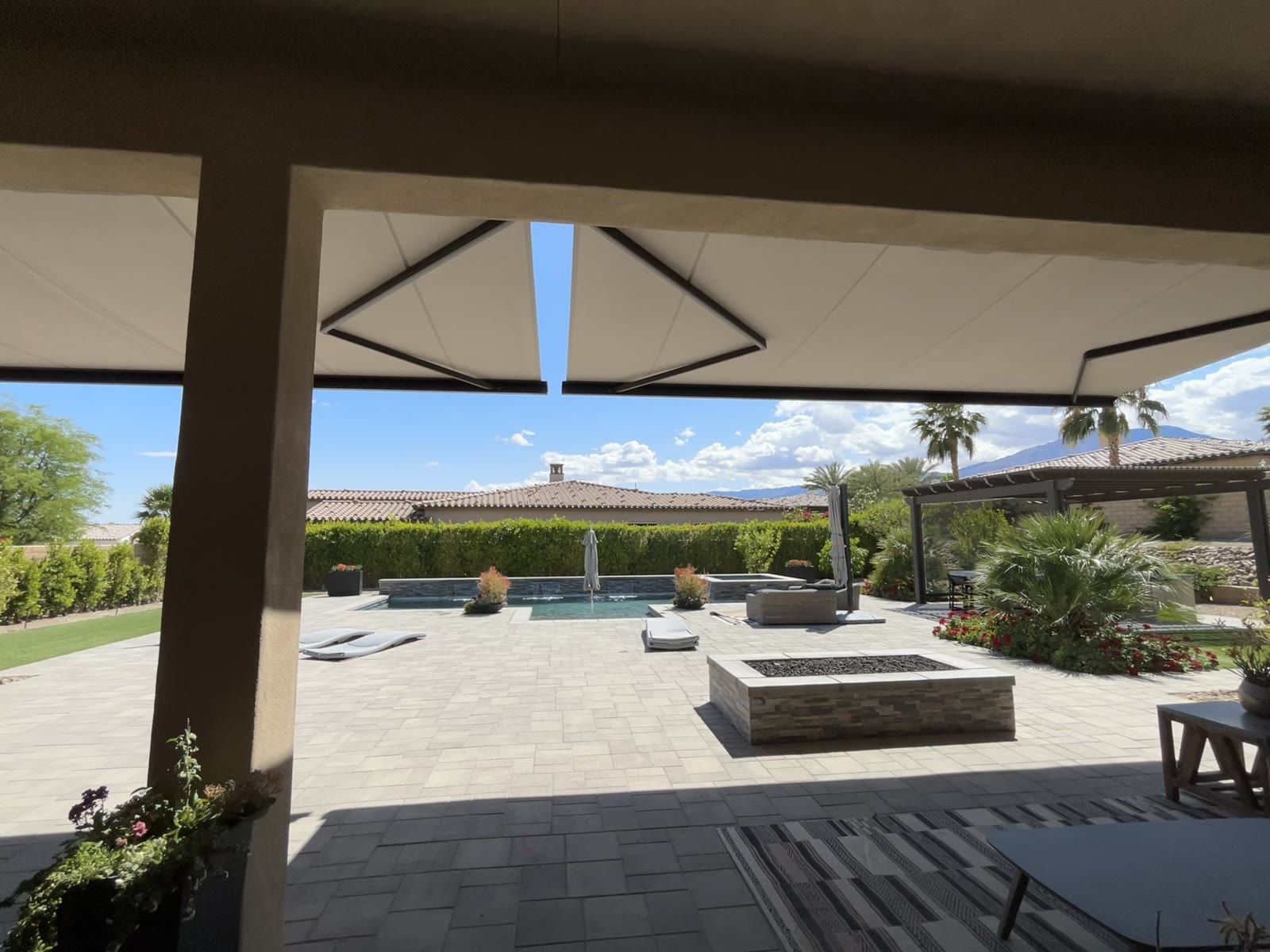 Retractable awning extended over a patio