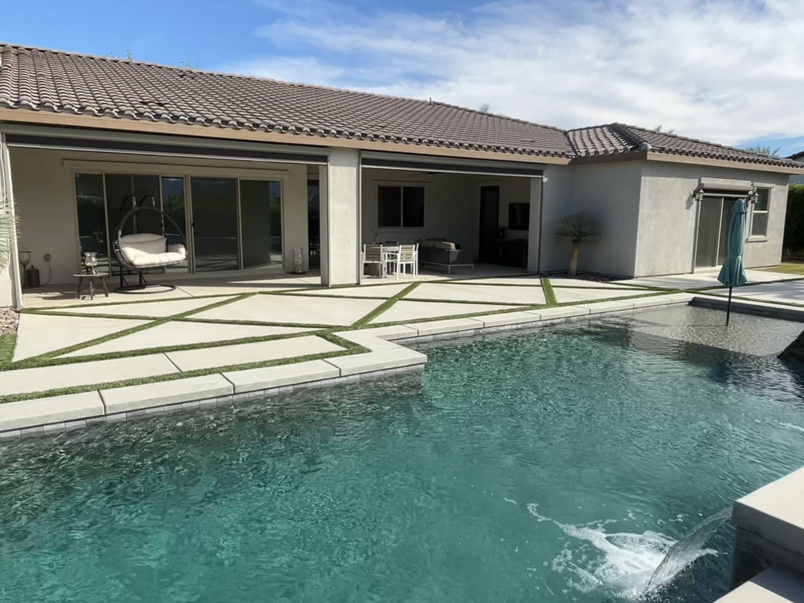 Exterior solar shades on a pool patio