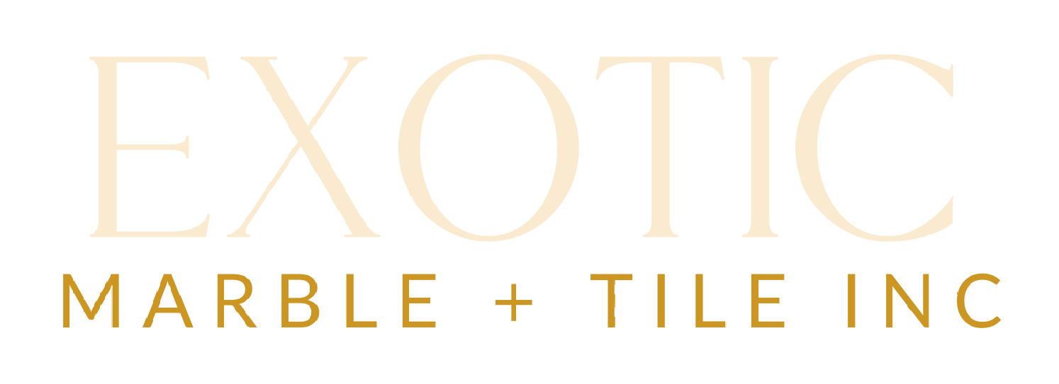 A logo for exotic marble and tile inc.