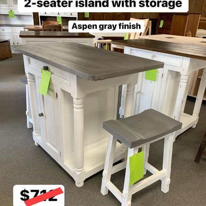 A 2 seater island with storage in aspen gray finish