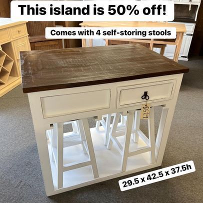 This island is 50 % off and comes with 4 self-storing stools.