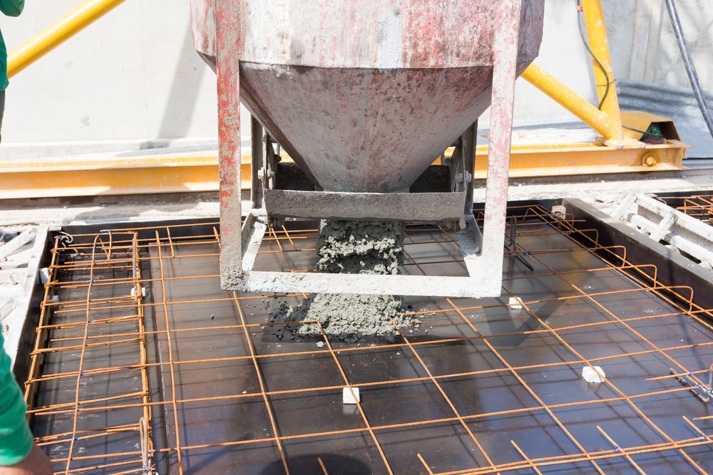 A Concrete Mixer Is Pouring Concrete Into a Concrete Slab — NQ Trading In Edmonton, QLD