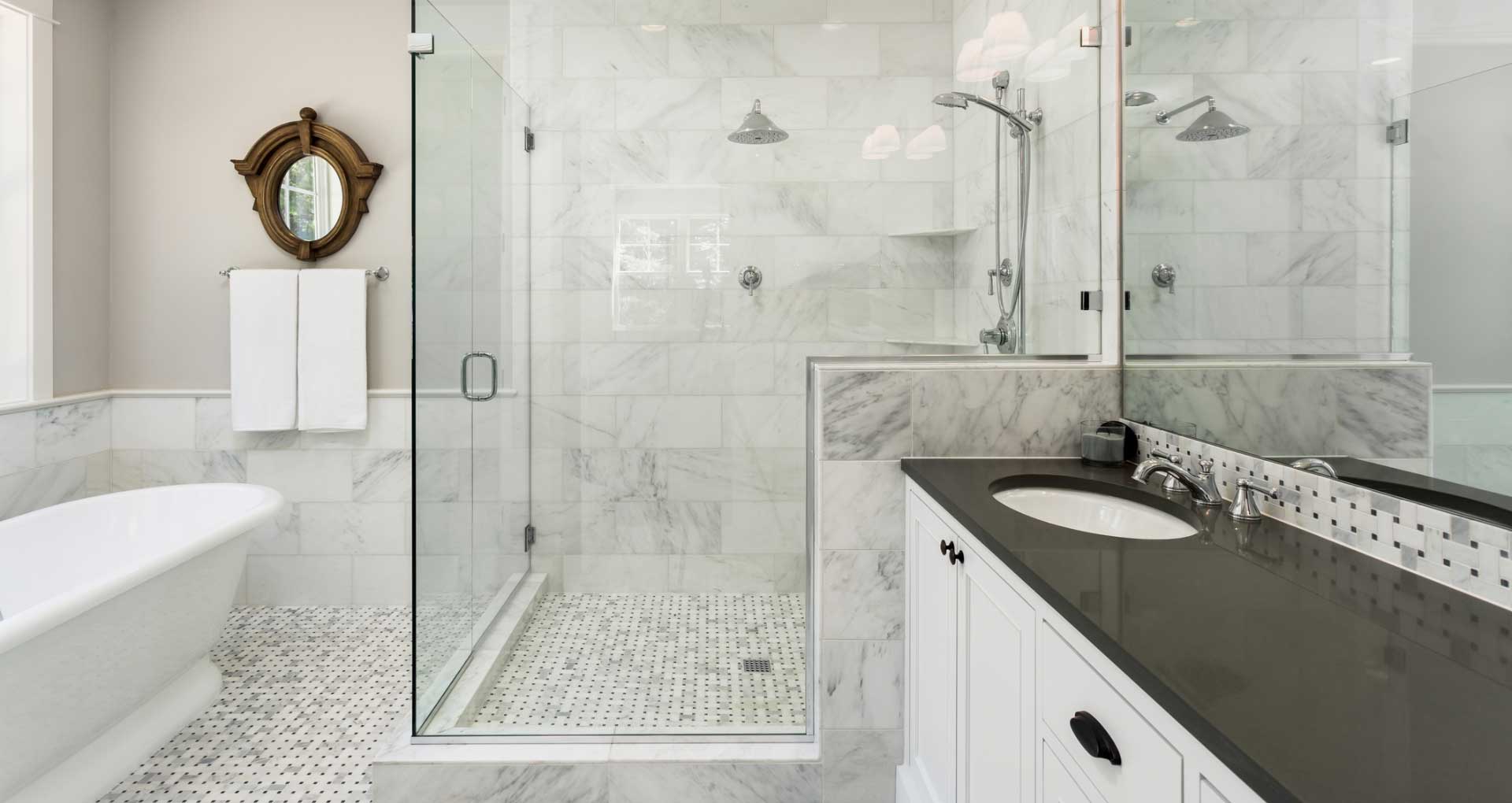 a picture of a shower, shower door serviced by Sunglass