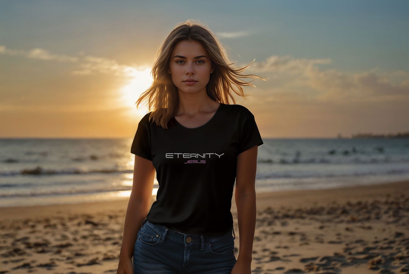 Woman on beach wearing black t-shirt with 