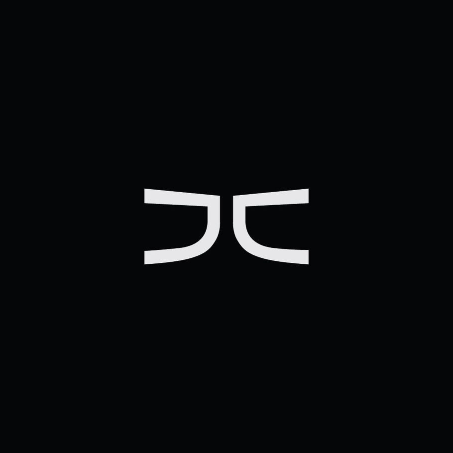 White stylized lettermark "JC" on a black background.