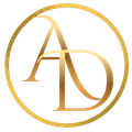 Gold AD monogram inside a thin gold circle on a white background.