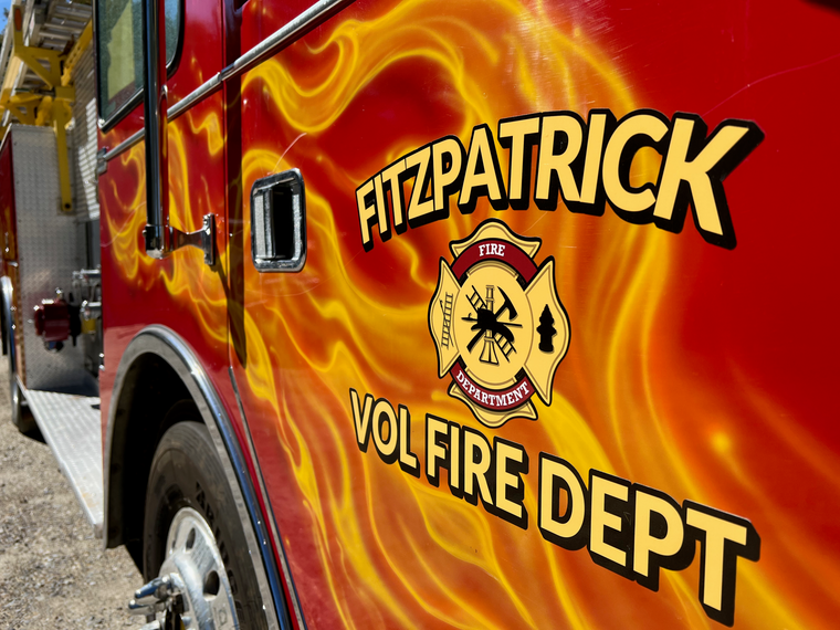 A red fire truck from the fitzpatrick vol fire dept