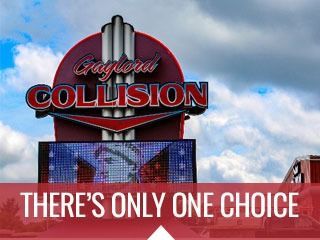Collisera Collision sign with a red marquee and “THERE’S ONLY ONE CHOICE” banner against a cloudy sky