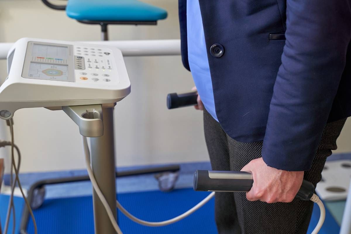 Closeup of woman on scale receiving body recomposition analysis near Lexington, Kentucky (KY)