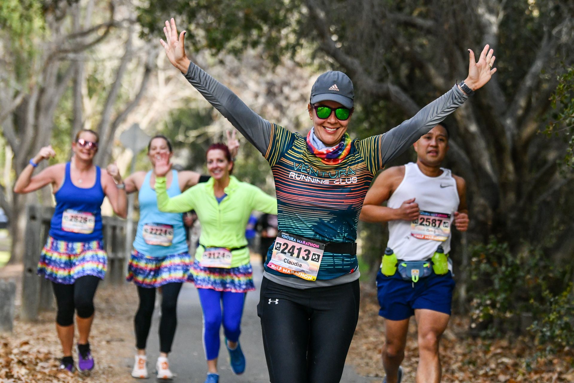 A group of women are running a marathon together.