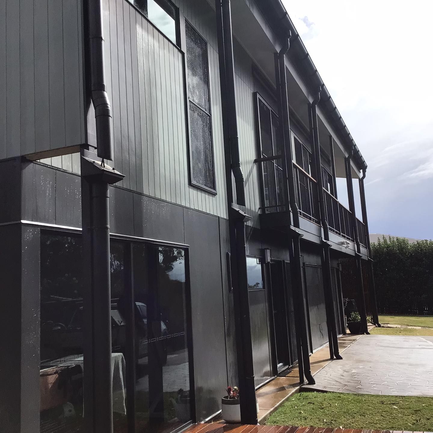A large building with a lot of windows and a balcony — O & D House Wash & Cleaning Services in Pittsworth, QLD