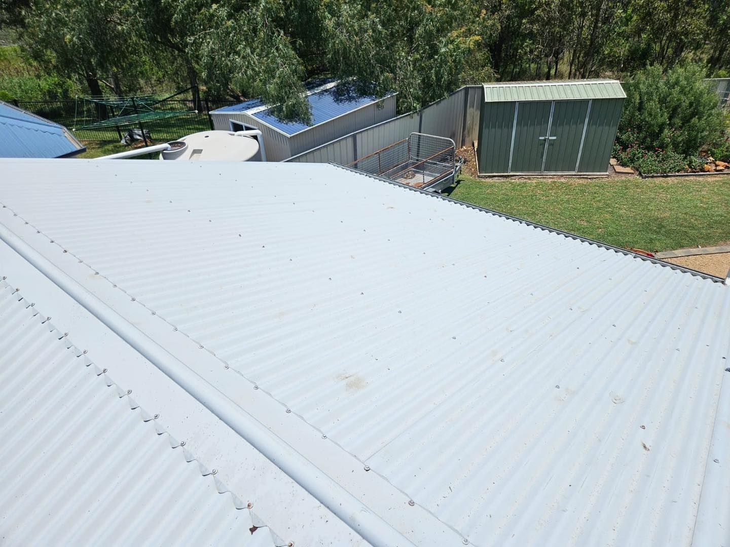 An Aerial View of a White Roof — O & D House Wash & Cleaning Services in Cambooya, QLD