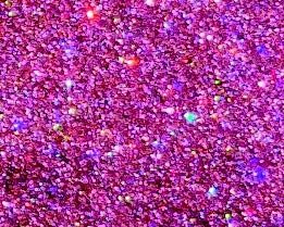 Close-up of sparkling pink, purple, and magenta glitter texture with scattered multicolored reflections