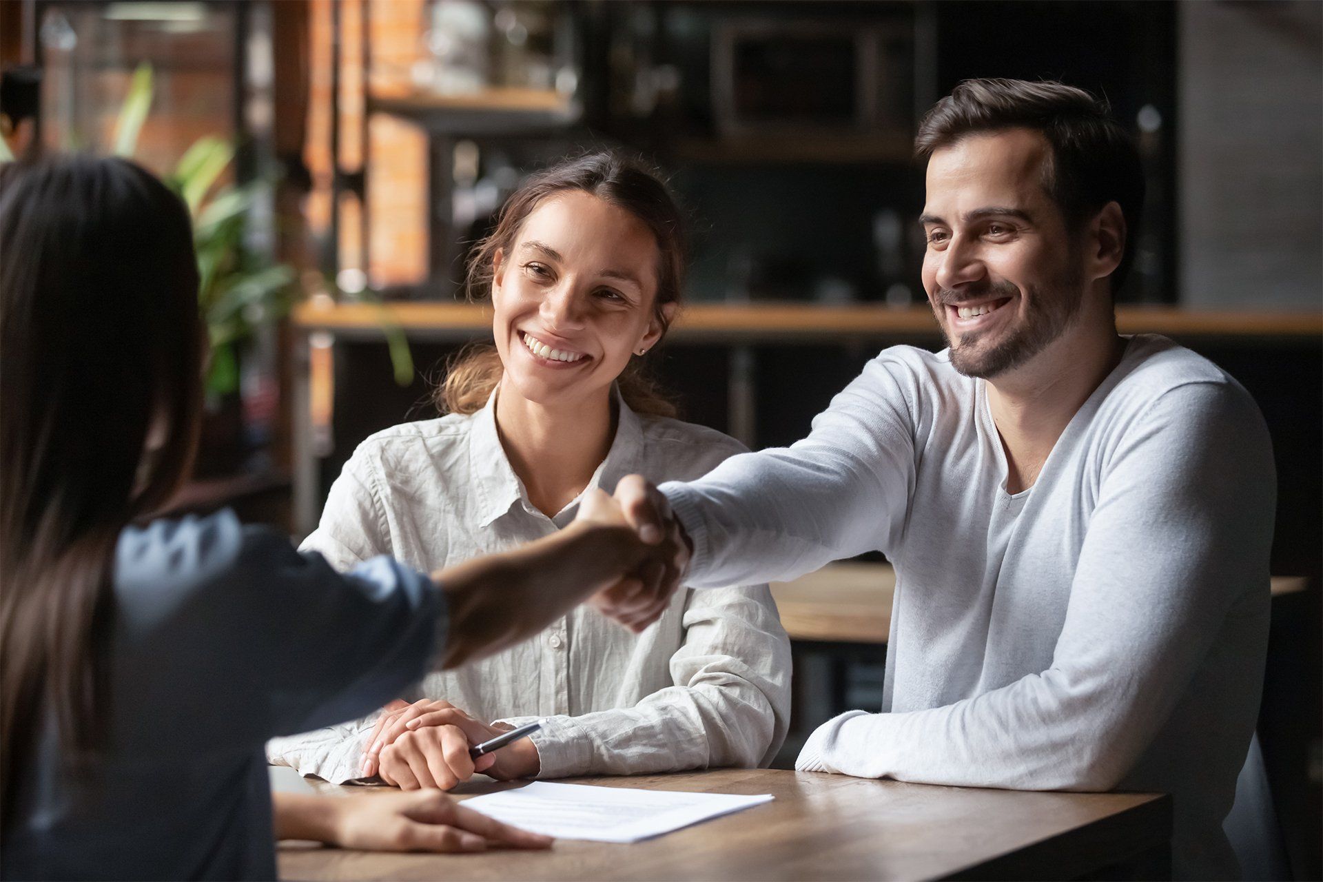 Shaking Hands With Insurance Agent