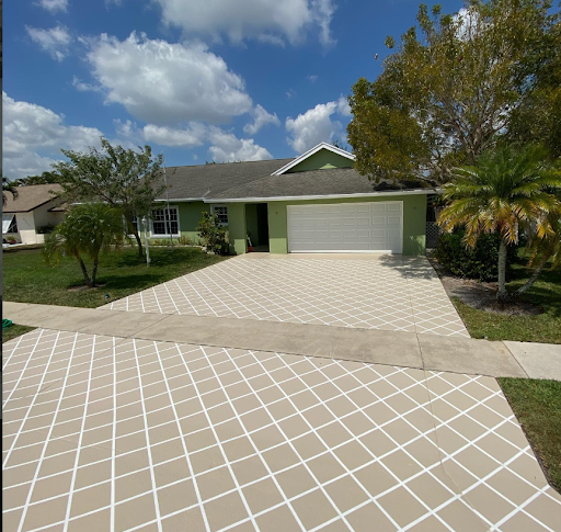 Single-story suburban house with a tiled driveway, garage, and palm trees under a partly cloudy sky