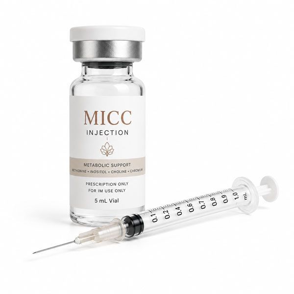 MICC injection vial with syringe on white background