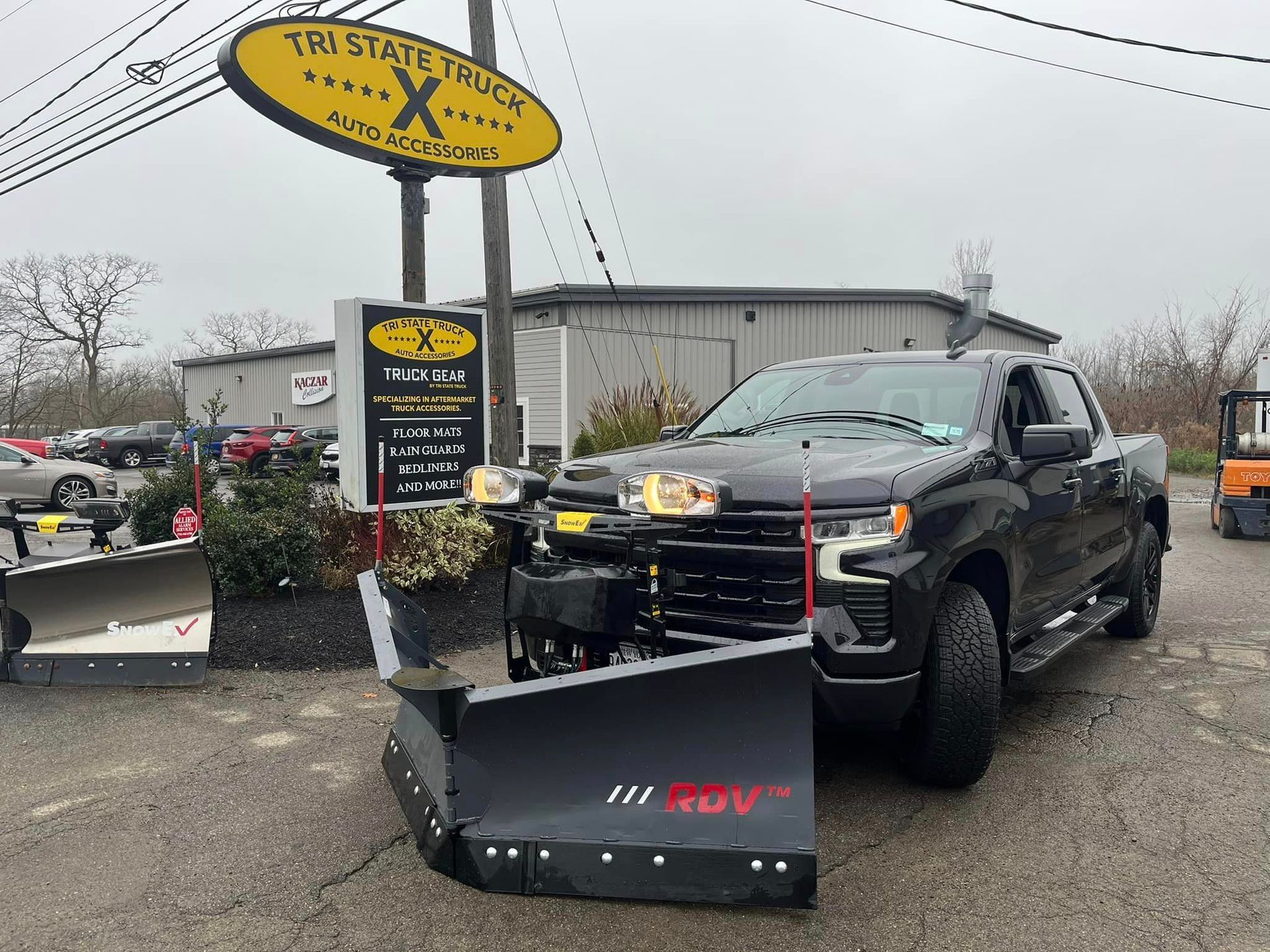 truck with a snow plow 3