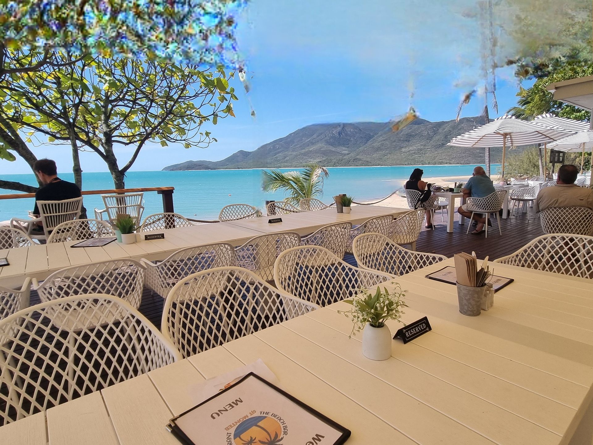 Restaurant overlooking an ocean — The Beach Bar and Restaurant at Montes in Cape Gloucester, QLD